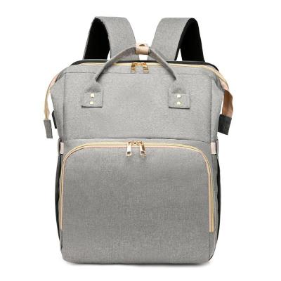 China With USB Changing Baby Bag Backpack For Moms Fashionable Bags With Changing Station Diaper Backpack for sale