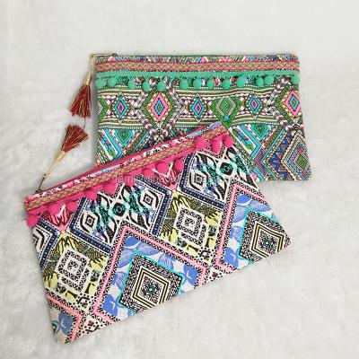 China Fashion Monogrammed Women Wholesale Boho Pom Tassel Cosmetic Bags Makeup Bag for sale