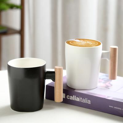 China Viable Wholesale Ceramic Custom Porcelain Mugs Coffee Handle Luster Ceramic Mug With Wooden Lid for sale