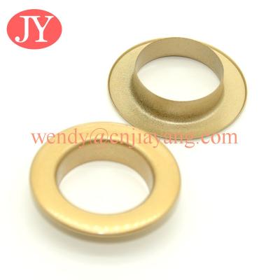 China Different size enamel brass metal eyelet with color logo for garment for sale