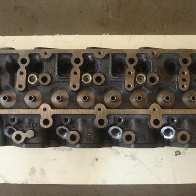 China HT250 QD32 CAST IRON Cylinder Head for sale