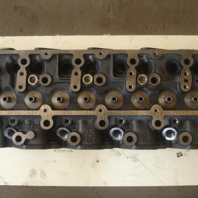 China Cast Iron Cylinder Head QD32 Engines Auto Parts for sale