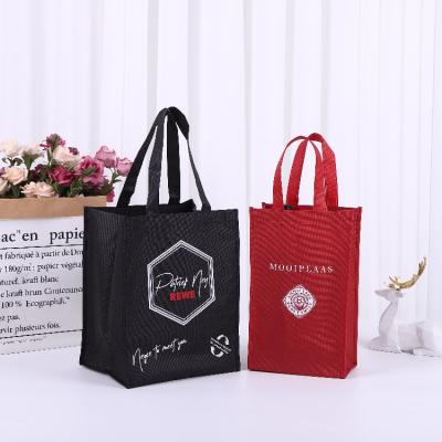 China 2023 Recyclable Hot Sales Promotion Logo Large Capacity Custom Nonwoven Shopping Bag Gift Bags Packaging Feast Bags With Handles for sale