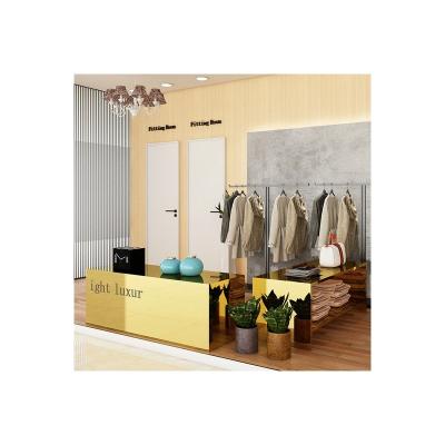 China Eco-friendly Tabletop Stock Display Hanger High-grade Gold Stainless Steel Shelf Clothing Display Rack for sale