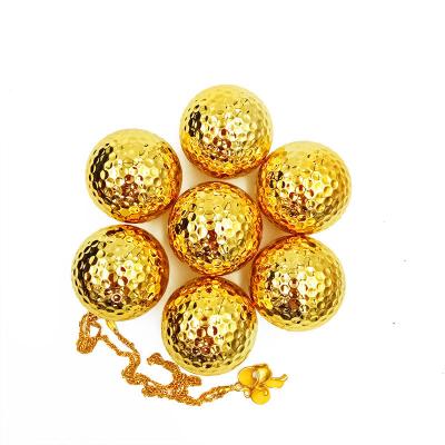 China Inner layer material: factory wholesale new golf balls gold plated gift synthetic rubber ball for sale