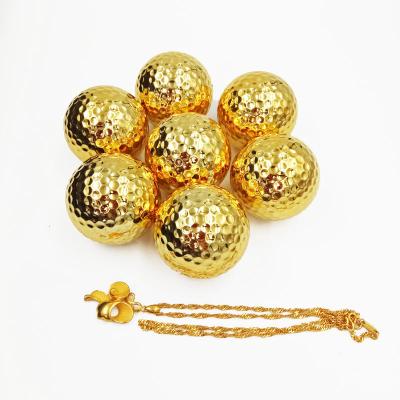 China Inner layer material: new golf balls gold plated gift synthetic rubber ball good workmanship for sale