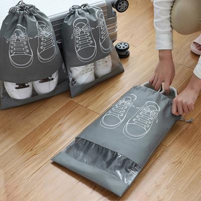 China Viable Cheap Transparent Travel Non Woven Fabric Drawstring Bags Dust Proof Travel Storage Shoes Bag for sale