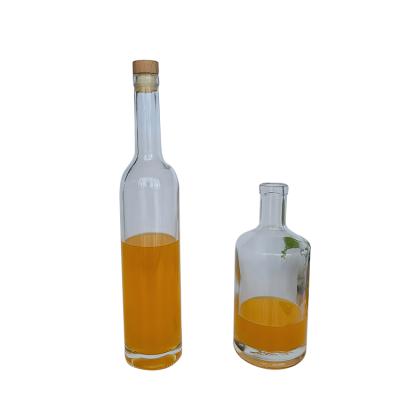 China Special Hot Selling 750ml Custom Food Round Neck Long Clear Wine Bottles Wi for sale