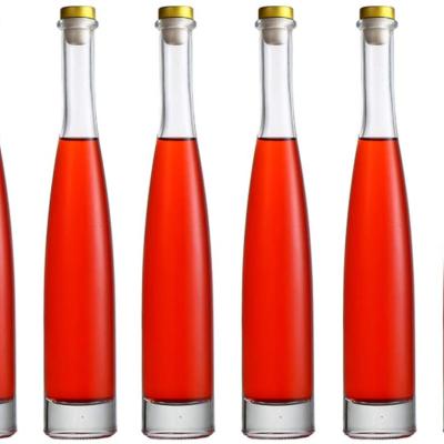 China 2021 New Design 500ml 750ml 1000ml Food Vodka Glass Bottle Wine Bottle Juniper Bottle for sale