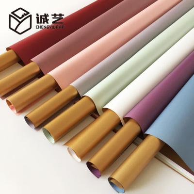 China OEM Design Matte 2 Tone Colors Luxury Gold Flower Wrapping Paper Waterproof Tissue Paper For Flowers for sale