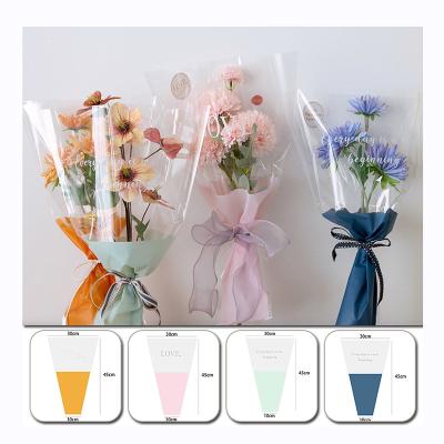 China Wholesale Fashionable Multi Bag English Transparent Waterproof Bouquet Packaging Bag Flowers Cellophane Waterproof for sale