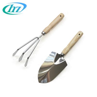 China Wholesale Good Quality Stainless Steel Plant Garden Shovel Hand Rake Gardening Digging Tools For Garden Planting for sale