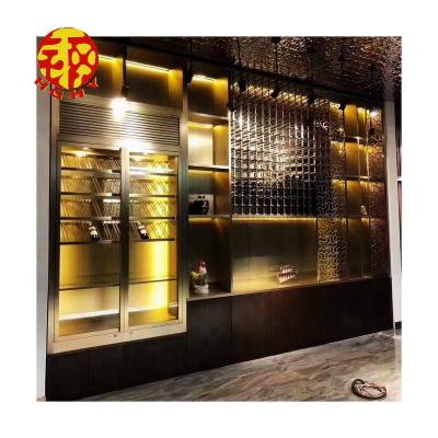 China Modern Expandable Gold Metal Shelf Wine Display Cabinet Stainless Steel Floor Standing Niche Shelf Cabinets for sale