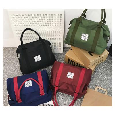 China Sports and Leisure New Products Wholesale in 2021 Women Men Waterproof Oxford Cloth Workout Shopping Gym Foldable Duffel Bag for sale