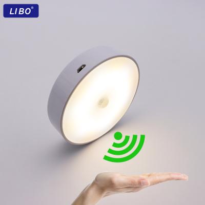 China New-designed PIR Motion Sensor Round LED Wall Lamp Energy Saving Ignition Rechargeable Cabinet Light LED Night Light for Cabinet Bedroom for sale