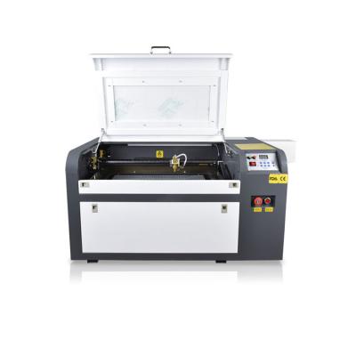 China Water Cooled China 4060 Pneumatic Engraving Machine CO2 Laser Engraving Marking Machine for sale