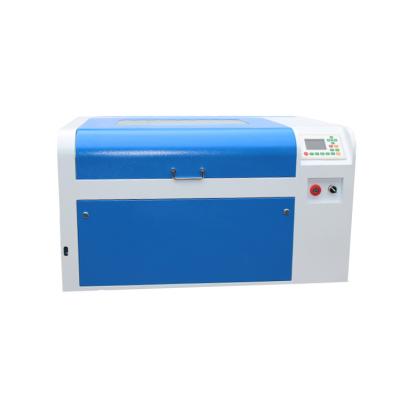 China Birds Leg Rings 100W Full-enclosed Professional CO2 Laser Engraving Cutting Machine Credit Card Laser Engraving Machine for sale