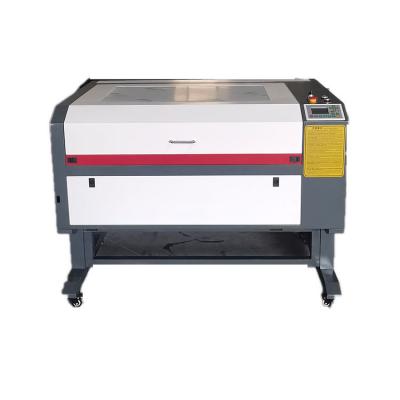 China Top Quality 6090 Full-enclosed Dogtag Laser Engraving Machine Red Nano Fiber Engraving Machine for sale