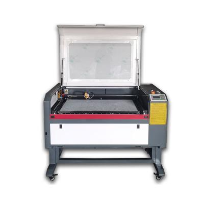 China Low Cost 6090 Rubber Stamp Laser Engraving Machine Full-enclosed Engraving Machine For Sunglass for sale