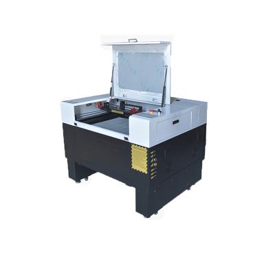 China Dm-5070 Interactive System Modern Design 80W Laser Engraving Machine CO2 Wood Laser Engraving Machine for sale