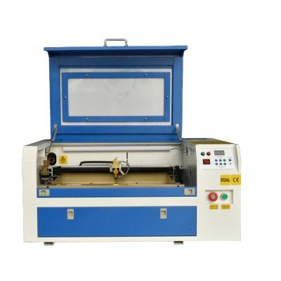 China Fabric High Performance 3050 CO2 Laser Water Cooled Acrylic Rubber Paper Leather Engraving Machine for sale