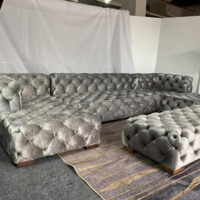 China Storage Button Tufted U Shape Velvet Chesterfield Sofa Living Room Sofa for sale