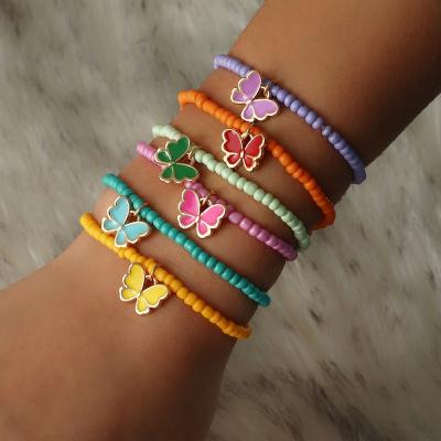 China 6pcs/Set TRENDY Bohemian Pastel Color Glass Seed Beads Oil Drip Butterfly Charm Bracelet Dangle Elastic Sets For Women Girls for sale