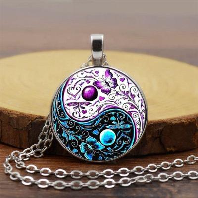 China 2021 Fashion Butterfly Print Yin And Yang Taiji Time Necklace Gem Time Glass Necklaces Taiji Jewelry Ethnic Wholesale for sale