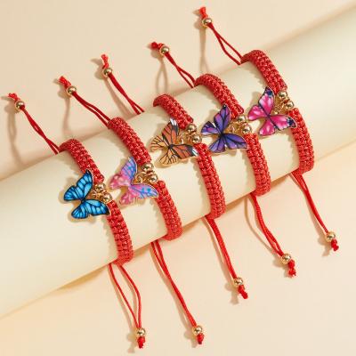 China 2022 String Butterfly Charm Bracelet Colorful Enamel Butterfly Casual/Sporty Handmade Woven Dangle Bracelets For Girls for sale