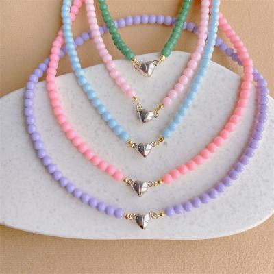 China FASHIONABLE Heart Magnet Love Pendant Necklace For Women Shape Korean Sweet Rice Bead Necklace Candy Contrast Beaded Choker Clavicle Chain for sale