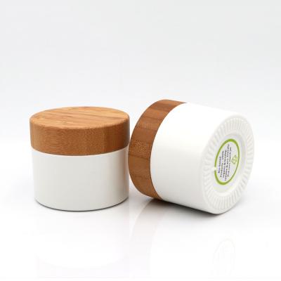 China 100% Recycable 30g 50g Environmental Biodegradable Plastic PLA Containers Cream Cosmetic Jar With Bamboo Lid for sale