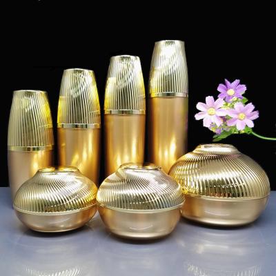 China Recycable 30/50/120g Gold Eye/Face Cream Jar Luxury Packing Jar 30/50/120ml Cosmetics Lotion Acrylic Container for sale