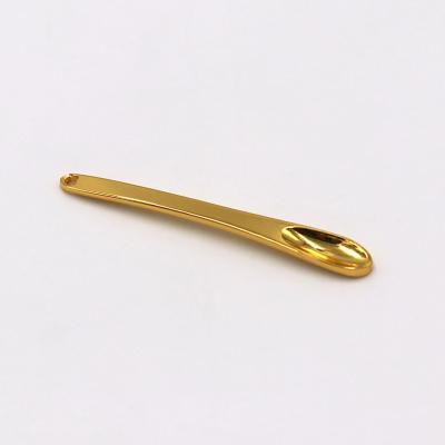 China Custom Recycable New Design Metal Small Size 5cm Cosmetic Spoon For Eye Cream for sale