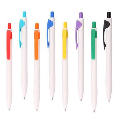 China Full Size Custom Logo Printing Solid White Plastic Ball Pen With Colored Clip And Plunger for sale