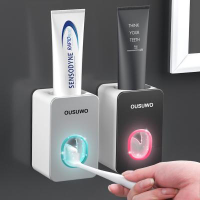 China Viable Wholesale Plastic Wall Mounted Bathroom Accessories Toothpaste Squeezer Household Automatic Toothpaste Dispenser for sale