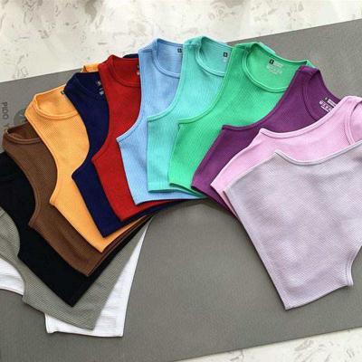 China QUICK DRY Cropped Women's Solid T-shirt Tank Top Seamless Streetwear Stretch Rib Knit Sleeveless Casual Tank Top Women for sale