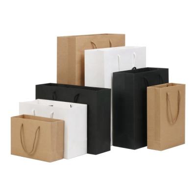 China Recyclable Printed Your Own Logo Packaging White Brown Kraft Gift Craft Shopping Paper Bag With Handles for sale