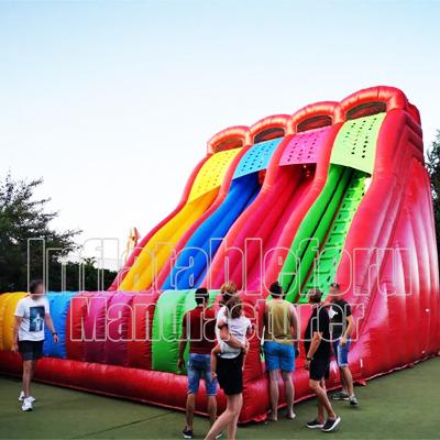 China Popular PVC Tarpaulin Giant Inflatable Slide With Rock Climbing Wall for sale