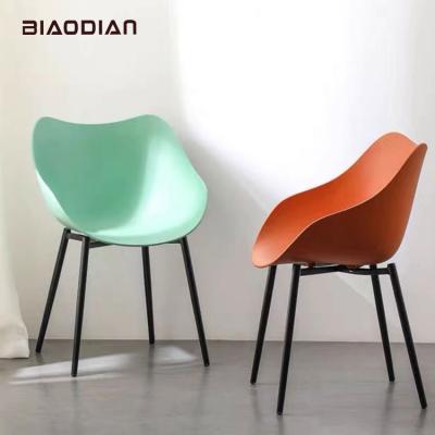 China Modern Patented Light Green Orange Plastic Armrest Seat Metal Leg Leisure Dining Chair for sale