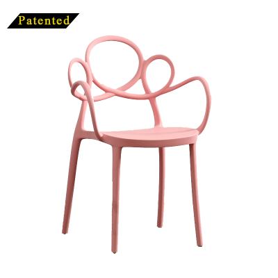 China Morden China Wholesale Special Dining Room Use Customized Patent Armrest OEM Pink Plastic Chair for sale