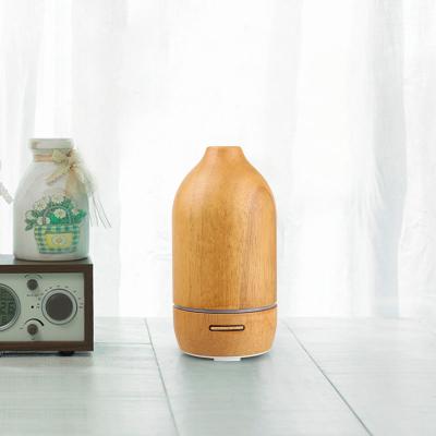 China 15-20 Grain 100ml Custom Ultrasonic Wooden Led Perfume Mini Humidifier Essential Oil Portable Air Diffusers for sale