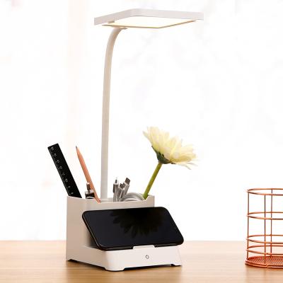 China Modern Fashion Folding LED Desk Lamp Student Reading Eysight USB Charging Desk Lamp with Phone Holder for sale