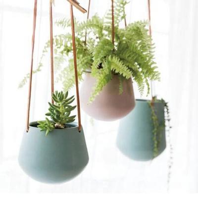 China Europe Garden Supplies Hot Selling Solid Color Design Matte Glazed Ceramic Hanging Pots Customized Hanging Pots For Plant for sale