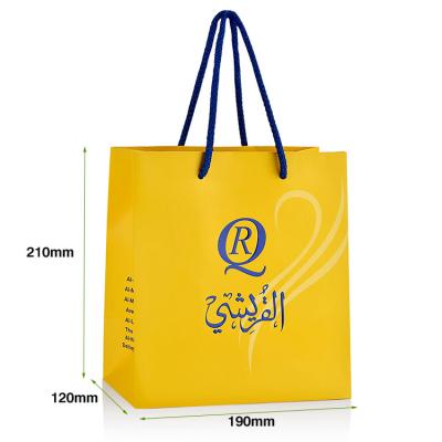 China Handmade Wholesale Custom Reusable Luxury Perfume Gift Paper Bag Clothing Shopping Bag for sale