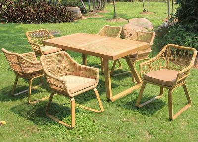 China Luxury Patio Garden Outdoor Dining Sets Resin Wicker Chairs Teak Table for sale