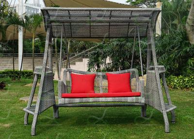 China Outdoor Swing Chairs Grey Color Rattan Wicker Patio Swing Cushions Included for sale