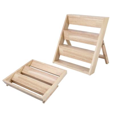 China China wholesale natural rustic paulownia solid display essential oil wooden rack for sale