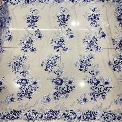 China Sustainable High Quality Flower Roll Sheer Gray Embroidered Lace Fabric for sale