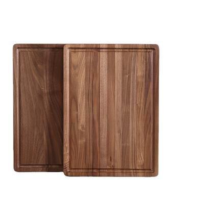 China Viable Classic Cutting Board with Groove for Kitchen Blackwalnut Fruit and Vegetable Steak Cutting Board for sale