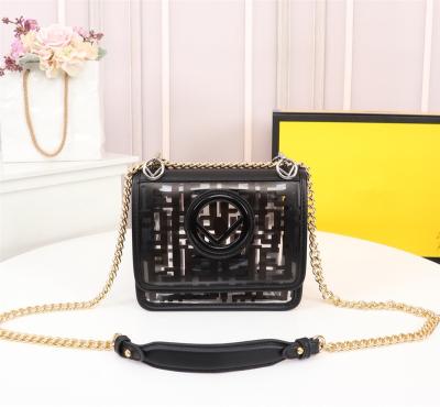 China 2022 New Design Luxury Lady Kid Jelly Bag 19cm Mini Waist Sling PVC Bag Match Cowhide Transparent Jelly Bag For Women Luxury Handbag for sale